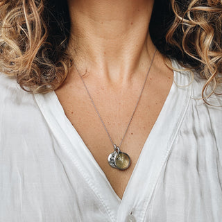 In motion silver Medallion