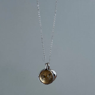 In motion citrine pendant